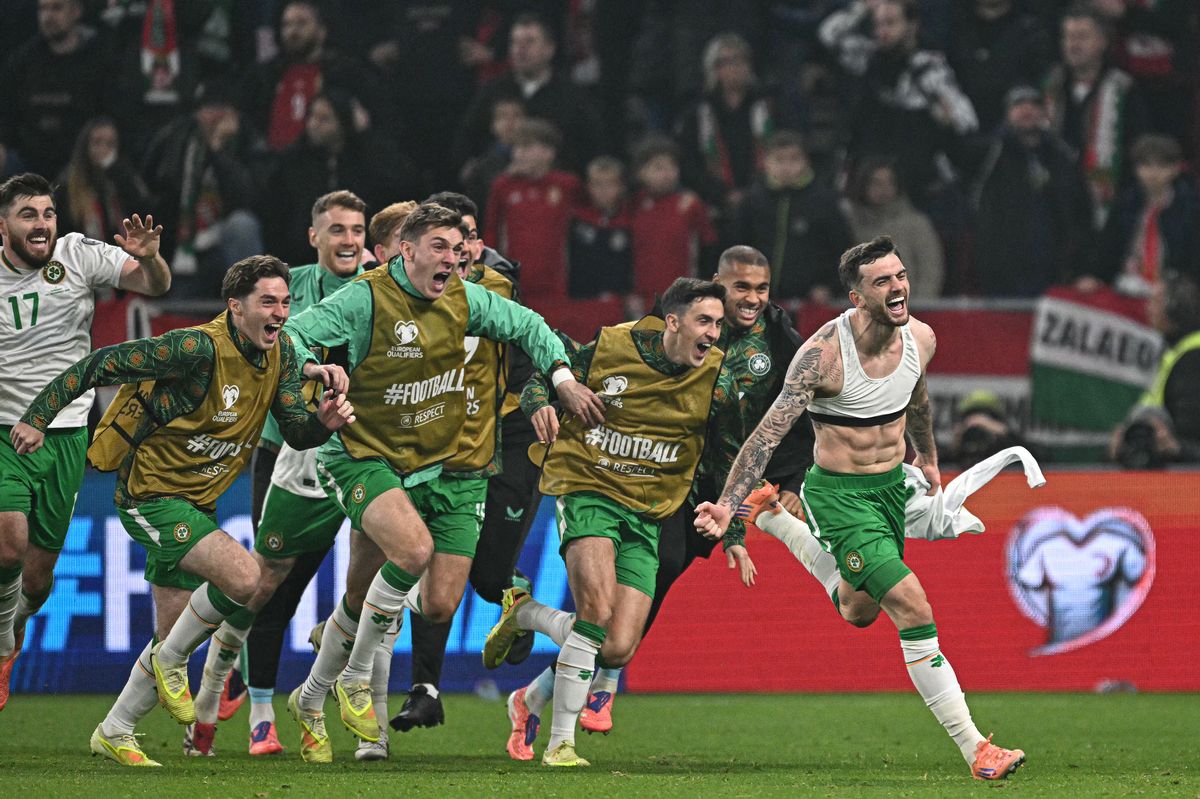 Troy Parrott celebrates scoring his third goal against Hungary