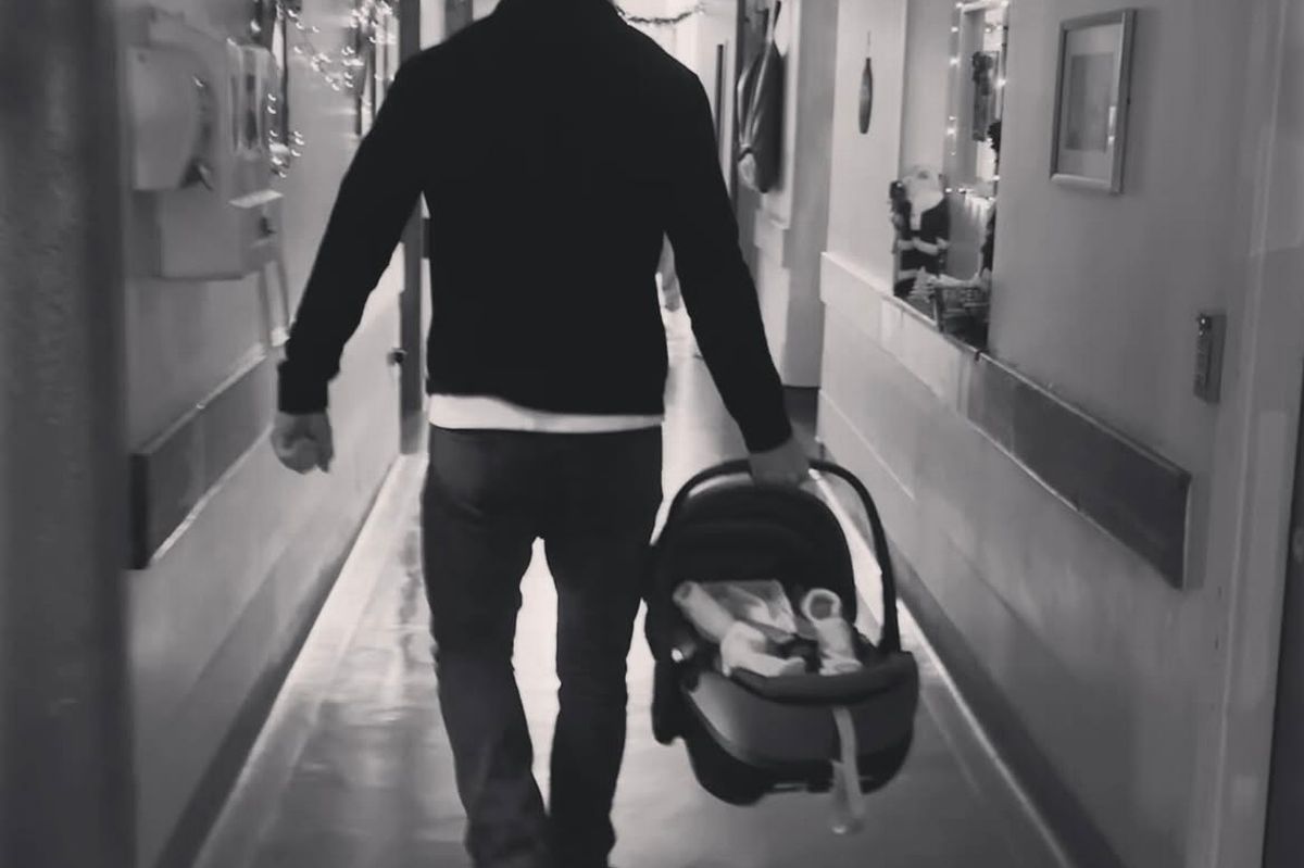 Robbie Henshaw and his baby.