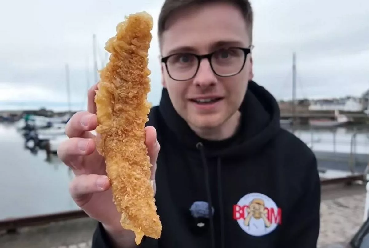 Paul holding his fish 