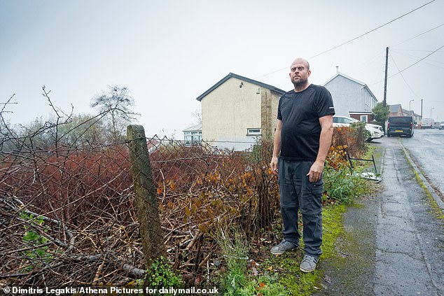 Neil Williams lives on the frontline of a huge patch of the plant which he claims has been left to grow wild by a local landowner