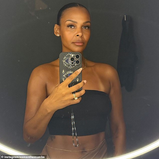 Samantha Mumba flashed a glimpse of her taut midriff in a black bandeau top as she posed for a series of sizzling snaps shared to Instagram on Tuesday