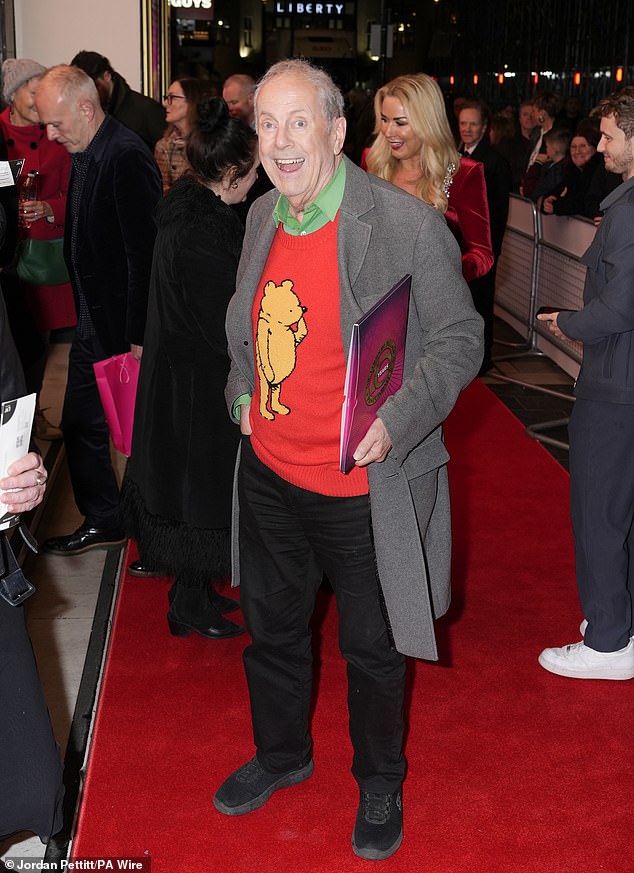 Sporting one of his signature jumpers, Gyles Brandreth was also in good spirits for the show