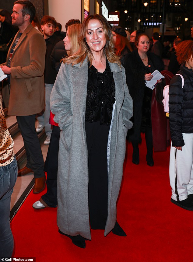 Natalie Cassidy wrapped up in a long grey coat as she arrived
