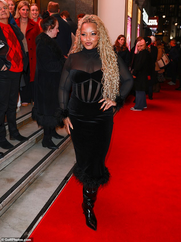 Marisha Wallace stunned in a panelled black mesh corset blouse and velvet mini skirt