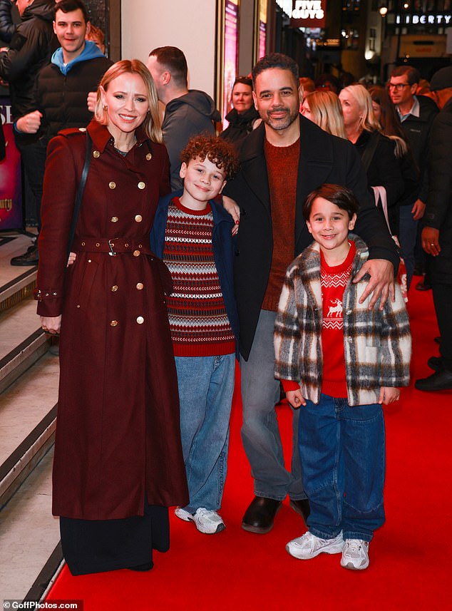 She was all smiles as she was joined by husband Justin Scott and their songs