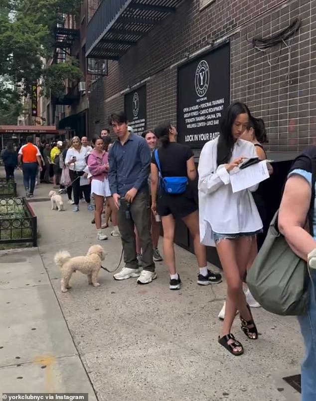 One local told the Daily Mail they were attracted to sign up for the gym because it offered a discount for 'founding members', and said the street was 'like a mob' because it was so popular