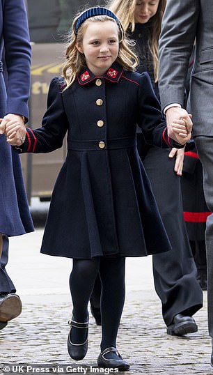 Mia wearing the military-inspired Monsoon coat to PRince Phillip's service of thanksgiving in 2022 before it was passed on to Lena