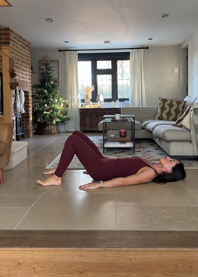 Lie on your back on the floor with knees bent and feet flat, hip-width apart.
