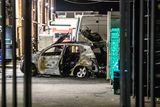 thumbnail: A burnt out car sits next to a cash-in-transit van behind Lucan Shopping Centre while Gardaí investigated the scene. Photo: Damien Storan.