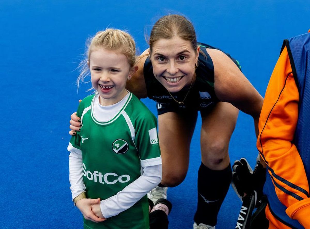 Katie Mullan and her mascot ahead of Mullan's 250th cap, vs England