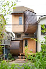 In Tokyo, Curved Copper Volumes and Hinoki Wood Boxes Build This Home Up, Not Out - Photo 3 of 15 - 