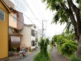 In Tokyo, Curved Copper Volumes and Hinoki Wood Boxes Build This Home Up, Not Out - Photo 2 of 15 - 