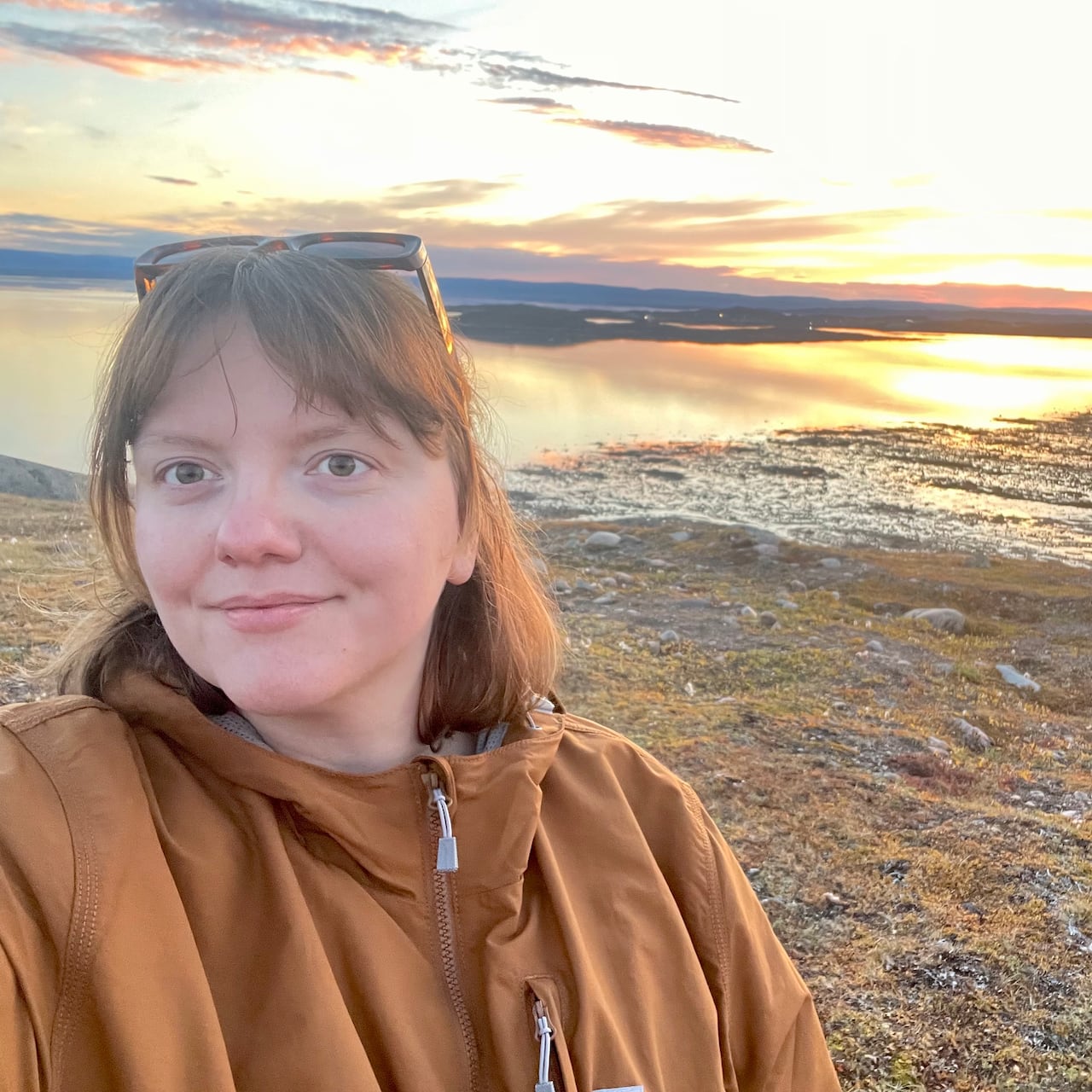 woman stands on the tundra