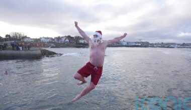 Crowds brave chilly temperatures for Christmas Day swim