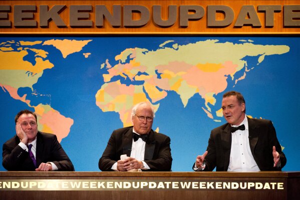 FILEW - Colin Quinn, from left, Chevy Chase and Norm Macdonald appear onstage at The 2012 Comedy Awards in New York, Saturday, April 28, 2012. (AP Photo/Charles Sykes, File)