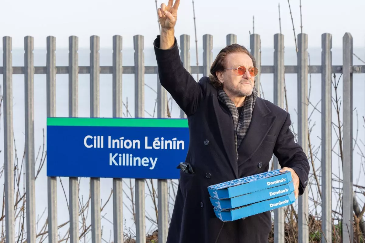 ‘Bono’ spotted as Domino’s opens new store
