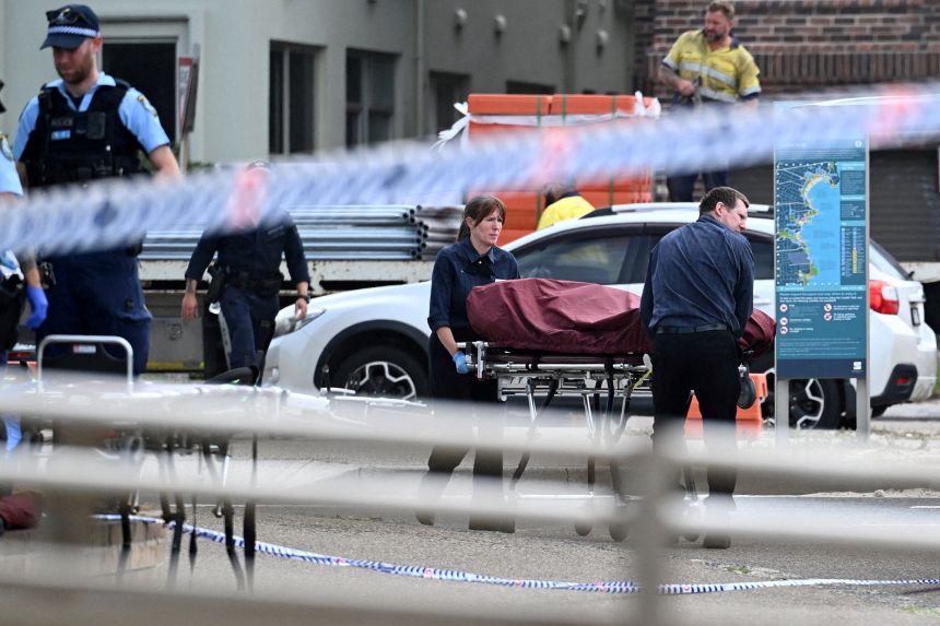 Police and Forensics begin the task of body retrieval from the site where a shooting incident occurred on a Jewish holiday celebration at Bondi Beach in Sydney, Australia December 15.