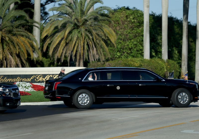 The motorcade with US president Donald Trump leaves Trump International Golf Club on the way to his Mar-a-Lago club. Photograph: Joe Raedle/Getty Images