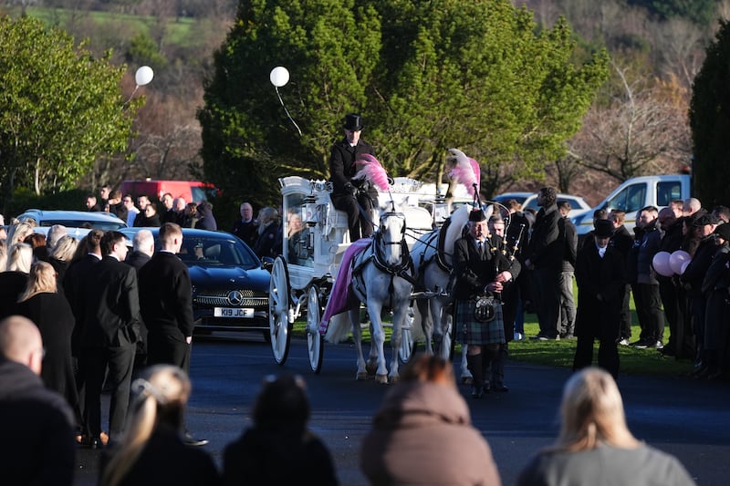 The coffin arrives by horse drawn hearse for the funeral at Daldowie Crematorium in Glasgow on Tuesday. Photograph: Andrew Milligan/PA Wire