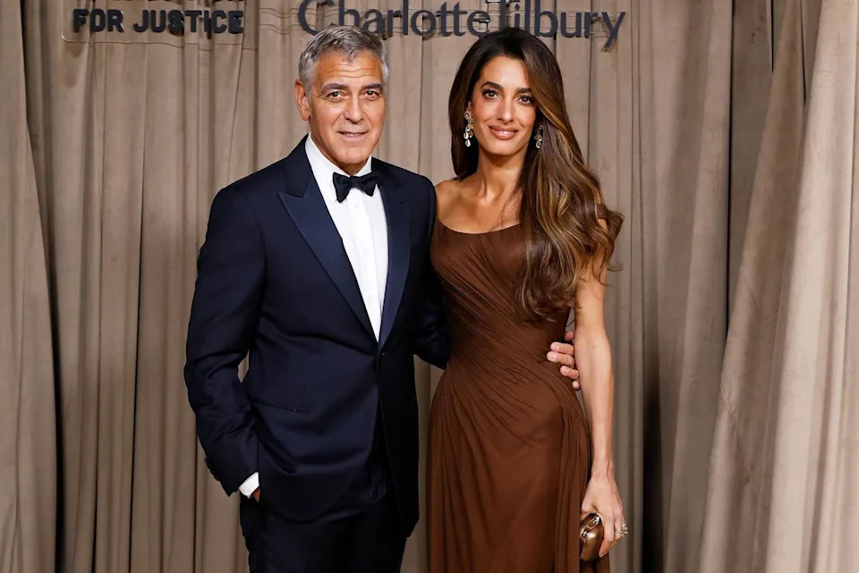 Taylor Hill/Getty George and Amal Clooney