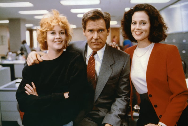 Melanie Griffith, Harrison Ford and Sigourney Weaver on the set of Working Girl. Photograph: Sunset Boulevard/Corbis via Getty