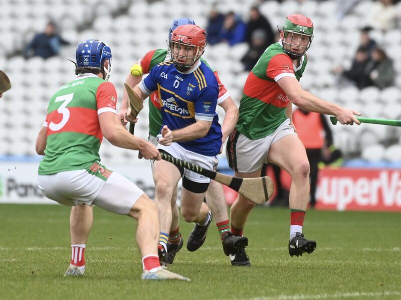  Paddy Walsh, Kilshannig, takes on Neil Lordan, Ballinora. Picture: Larry Cummins