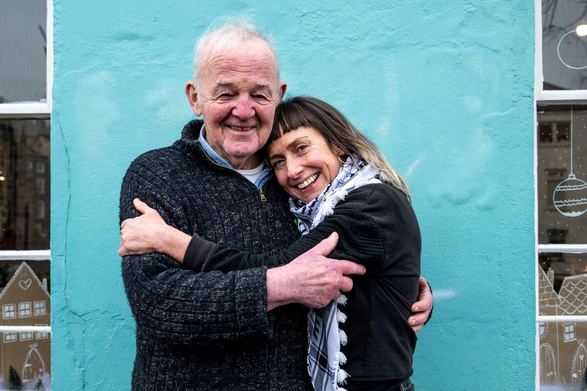 An emotional moment as Arthur Leahy and Virginia O’Gara embrace outside the Quay Co-Op. Picture: Chani Anderson.