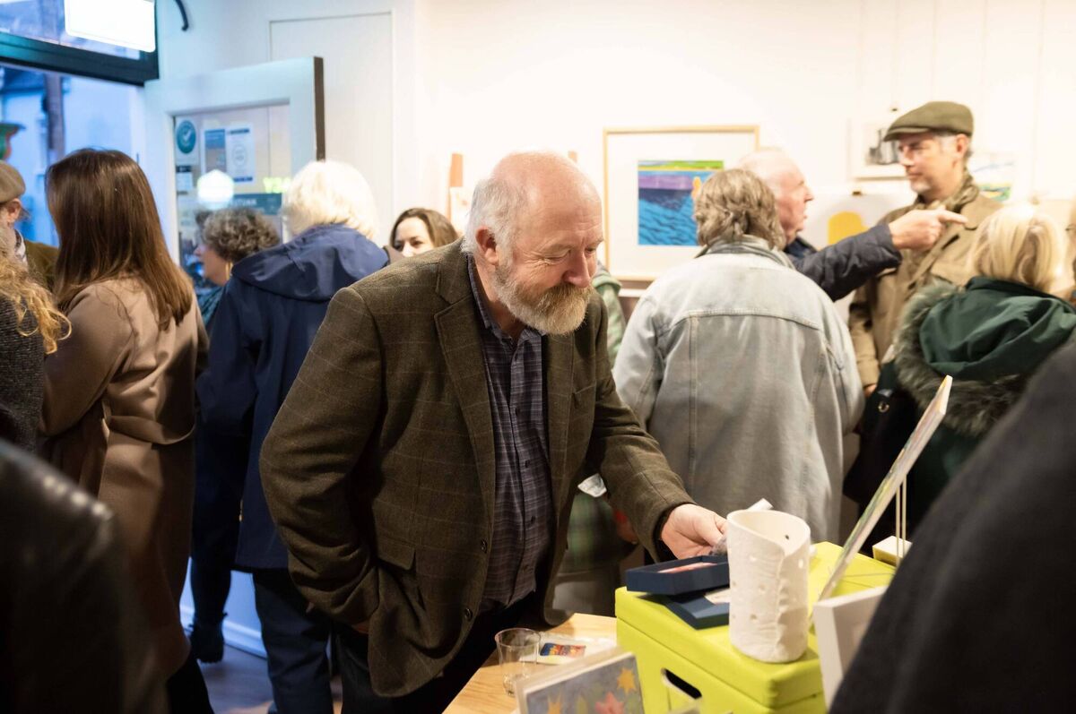 Cork County Arts Officer Ian McDonagh enjoys some of Gallery Mór wares.