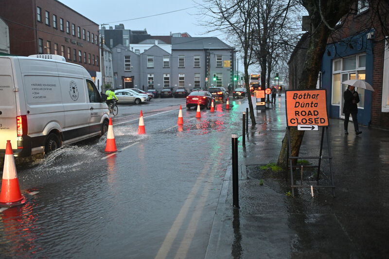 High tide surges over the River Lee at South Terrace and Georges Quay in Cork on Tuesday morning. Picture: Dan Linehan