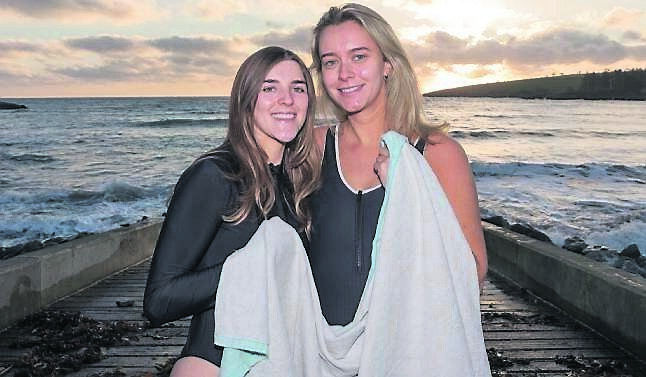 Juliette Collins, Rochestown, and Jill Donegan, Douglas, at the Christmas Day swim in Fountainstown, Co Cork. Picture: David Creedon
                    