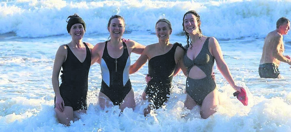 Anna and Terri O’Keefe, Claire Coffey, and Caoimhe O’Keeffe enjoying their Christmas Day swim at Myrtleville, Co Cork. 	Picture: Dan Linehan
                    