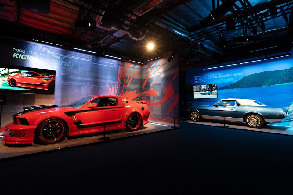 Ford Mustangs from left, a 2008 GT used in the 2010 movie "Kick-Ass," and a 1973 car that was used in "The Mary Tyler Moore Show" are seen at "American Icon: A Mustang Immersive Experience," Saturday, Nov. 22, 2025, in Los Angeles.