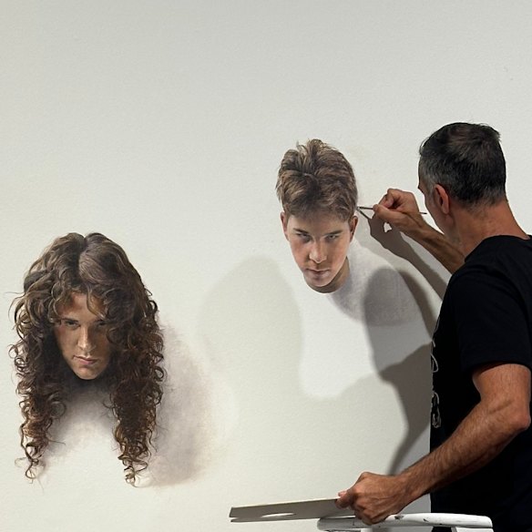 Trompe-l’oeil paintings of two of Zavros’s children’s heads at the Dunedin gallery.