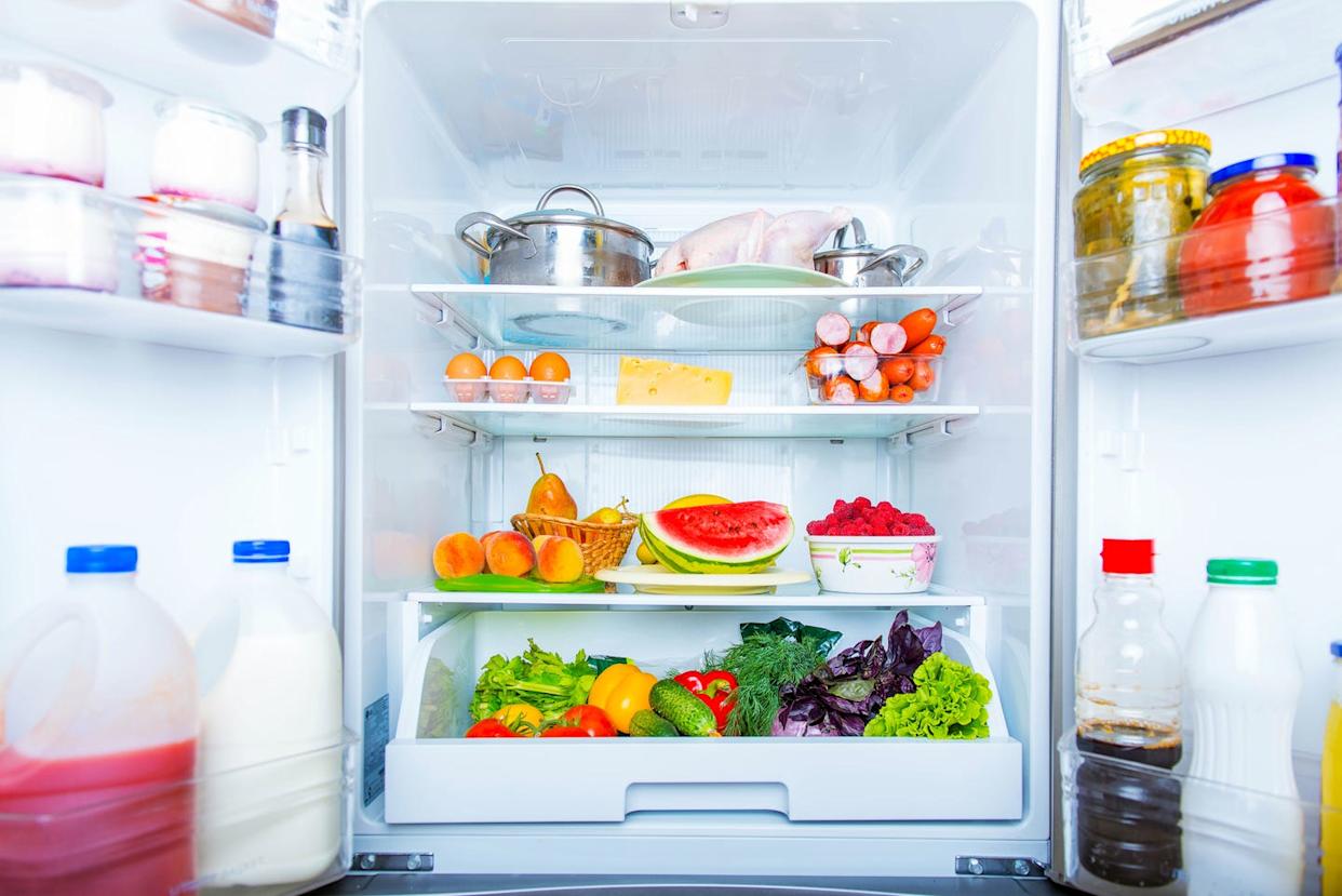 open refrigerator filled with food