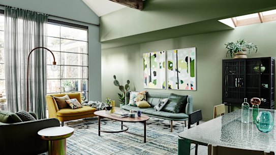Soft, warm greens have become a popular choice for living spaces thanks to their associations with the natural environment.