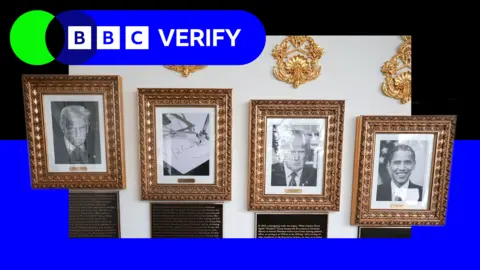 Getty Images Four portraits, Trump on the left, followed by Biden (depicted by an autopen), a second Trump one and then Obama. Underneath each portrait, the plaque can be seen