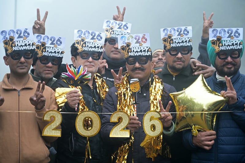 Revellers in Amritsar, India, get ready to usher in 2026. Photograph: Narinder Nanu/Getty