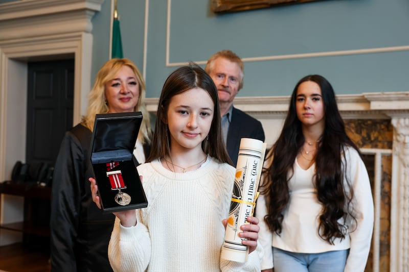 Carla Murphy with Diana Murphy, Sean Murphy and Isabel Murphy at the National Bravery Awards in Leinster House, Dublin. Photograph: Maxwell Photography/PA Wire 
