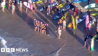 Surfers and swimmers pay tribute to victims of Bondi shooting