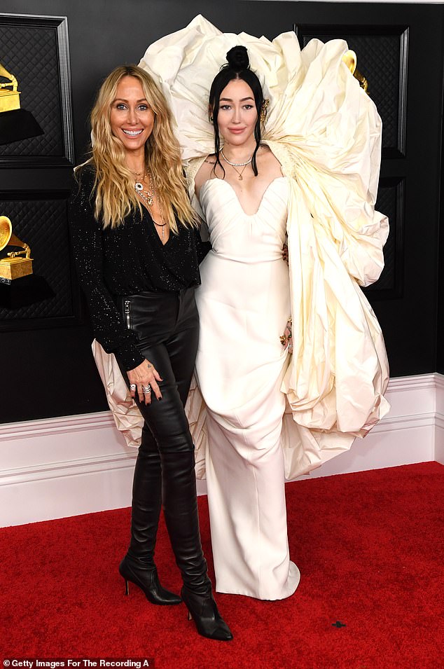 ¿I absolutely love Christmas and love the holidays,¿ she said. ¿But it keeps looking different every year. It gets a little harder, I think, when the kids are older and everybody¿s got different families that they have to be with for the holidays' (Noah and Tish pictured in 2021)