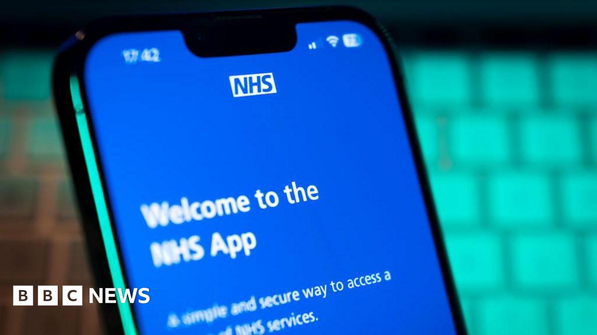A phone with a blue screen on it. The screen has white writing on reading "Welcome to the NHS app".