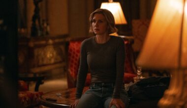 Carol (Rhea Seehorn) sitting down in Pluribus