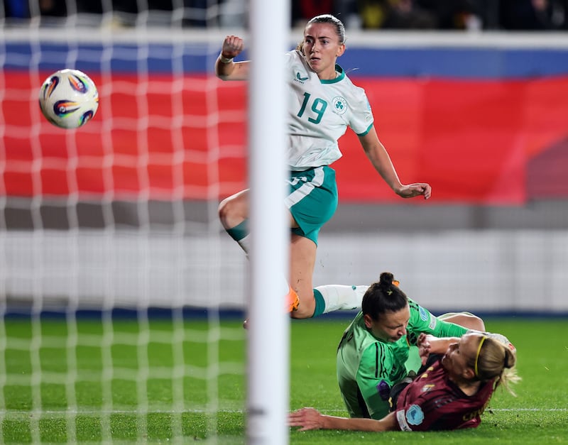 Abbie Larkin keeps her cool to dink the ball over the goalkeeper for a decisive goal for Ireland against Belgium. Photograph: Ryan Byrne/Inpho