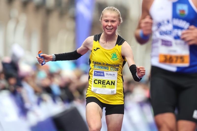Ava Crean crosses the line to to win the women's national title at Dublin Marathon. Photograph: Bryan Keane/Inpho