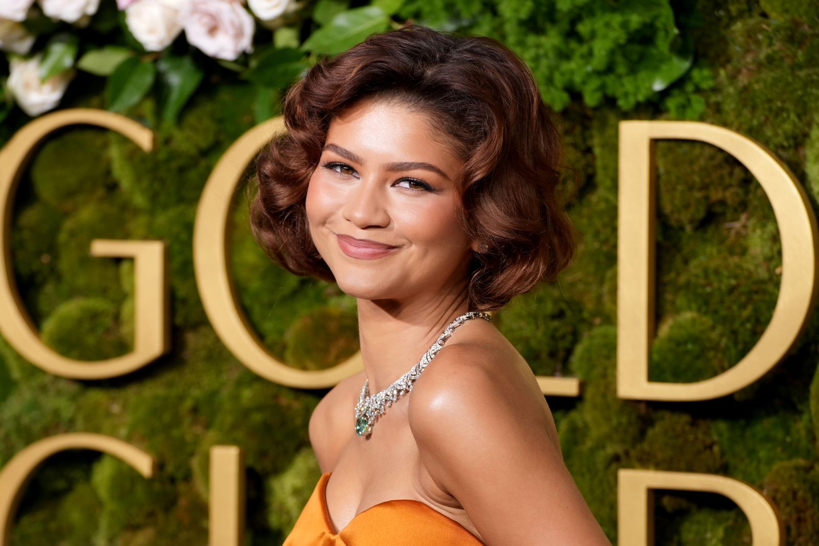Image may contain Zendaya Head Person Face Dimples Happy Smile Body Part Neck and Adult