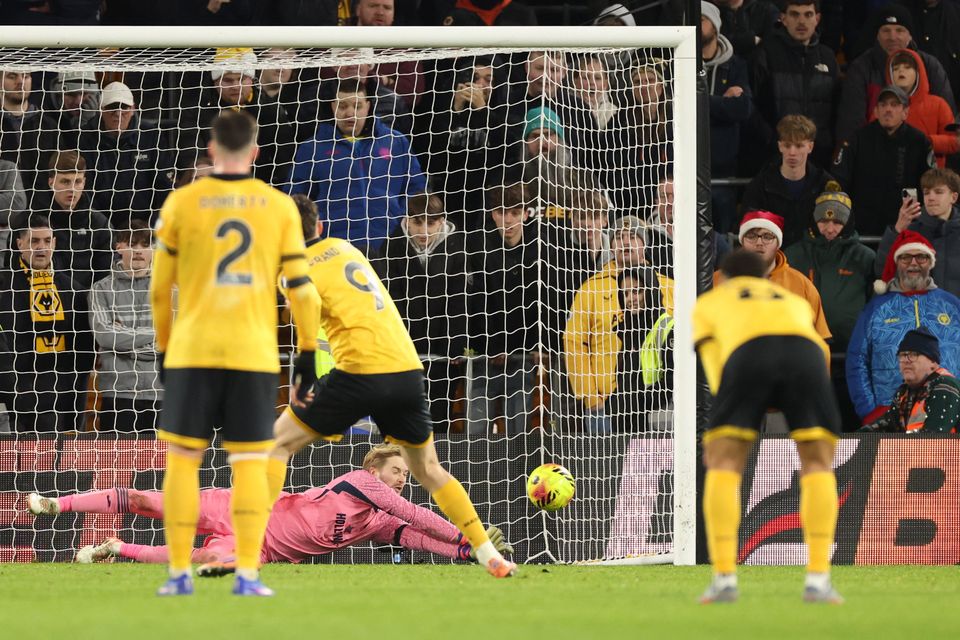 Caoimhin Kelleher of Brentford saves a penalty from Joergen Strand Larsen of Wolverhampton Wanderers