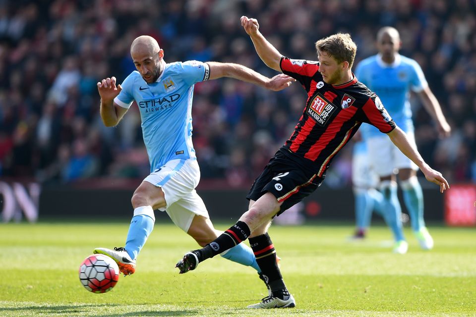 Eunan O'Kane of Bournemouth and Pablo Zabaleta of Manchester City compete for the ball during a Premier League clash at Vitality Stadium on April 2, 2016. Photo: Mike Hewitt/Getty Images