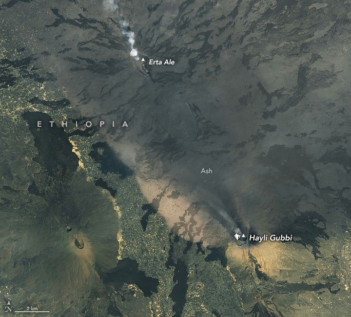 An image of Ethiopia from space, showing a growing brown ash plume over the landscape