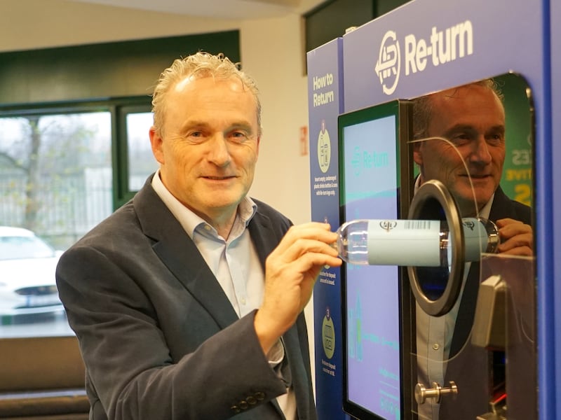 Re-turn CEO, Ciaran Foley, demonstrates the recycling system for plastic bottles. Photograph: Enda O'Dowd
