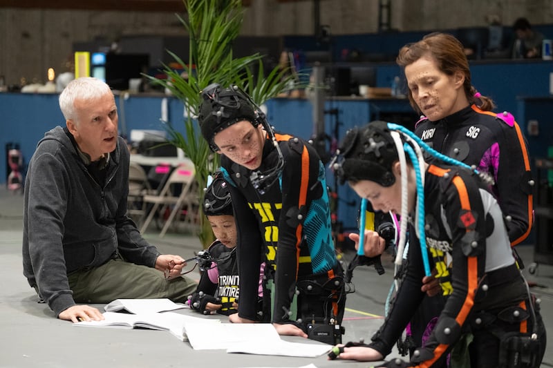 James Cameron, Trinity Bliss, Britain Dalton, Jack Champion and Sigourney Weaver on the set of Avatar: Fire and Ash. Photograph: Mark Fellman